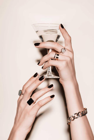 lecil-nails-on-womans-hands-holding-a-sexy-martini-great-jewellry - LeCil
